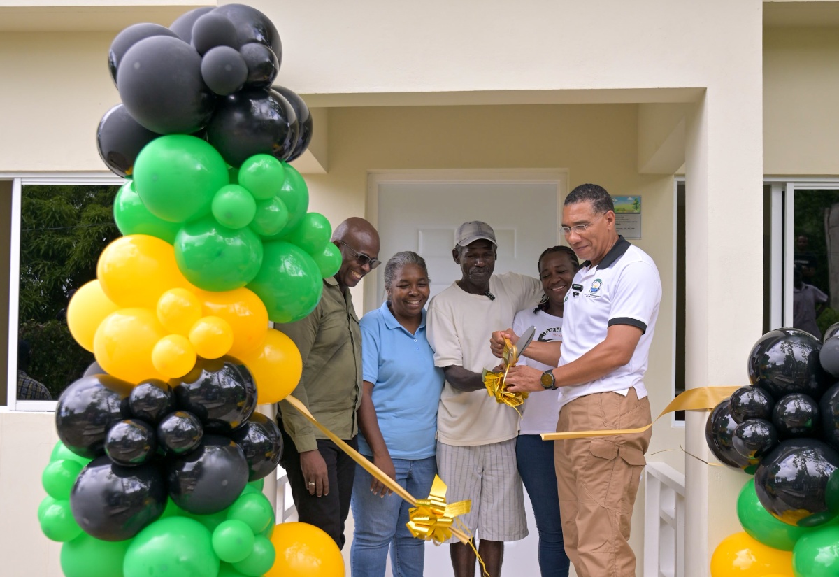 PHOTOS: PM Hands Over Houses To Two Families in Clarendon