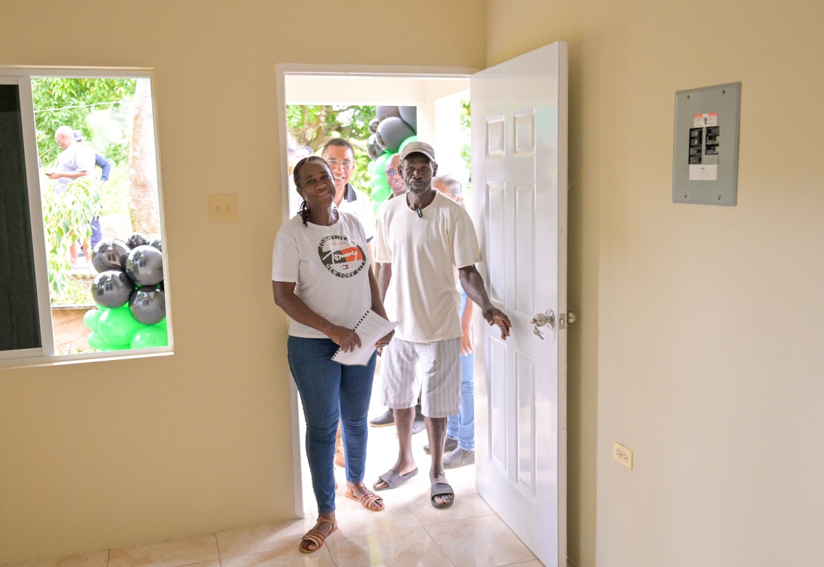 PHOTOS: PM Hands Over Houses To Two Families in Clarendon