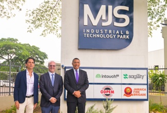 Prime Minister, Dr. the Most Hon. Andrew Holness (right), shares a photo opportunity with (from left) Chairman, MJS Industrial and Technology Park, Michael Subratie, and Executive Chairman, Musson Group, Paul B Scott, during the opening ceremony for the MJS Industrial and Technology Park in Spanish Town, St. Catherine, on June 24.