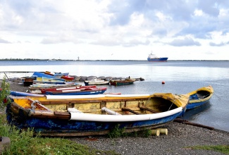 Fishing vessels on a beach on Jamaica’s southern coast.