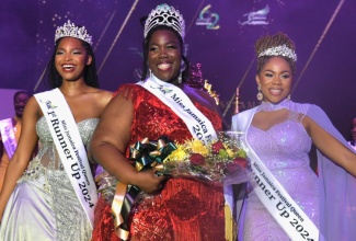 Miss Jamaica Festival Queen 2024, Omolora Wilson (centre), flanked by first runner-up, Miss Manchester, Shannoya Houston (left), and second runner-up, Miss Kingston and St. Andrew, Daindra Harrison, during the 2024 national coronation.

