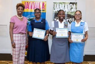 Tourism Information Centre Manager at the Jamaica Tourist Board (JTB), Lucretia Green (left), with The Manning’s School Jullisa Dujon; Montego Bay High School’s Kiara Bowman, and Hampton School’s Caleader Lewinson, following the completion of the first round of the annual Junior Minister of Tourism Competition, at the Sandals Ochi Beach Resort, St. Ann, on June 20.

