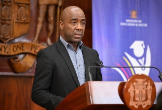 Education Transformation Oversight Committee (ETOC) Chairman, Dr. Adrian Stokes, addresses Wednesday’s (July 23) ETOC Press Conference, at Jamaica House.