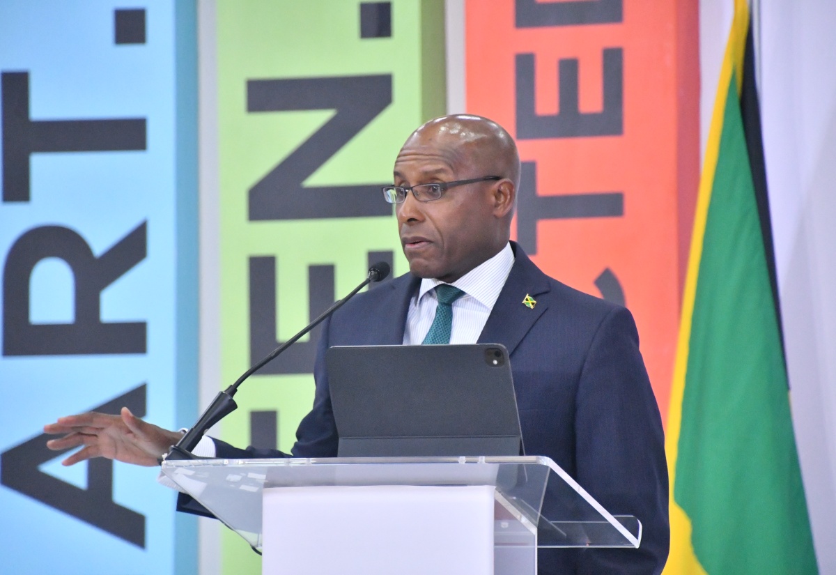 Minister of Industry, Investment and Commerce, Senator the Hon. Aubyn Hill, addresses the opening ceremony of the Caribbean Investment Forum (CIF), at the Montego Bay Convention Centre in St. James, on Tuesday (July 29). The forum concludes on July 31. 

