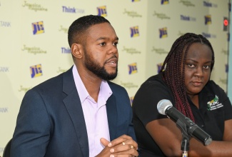 Chairman of the St. James Municipal Corporation and Mayor of Montego Bay, Councillor Richard Vernon, addresses a Jamaica Information Service (JIS) ‘Think Tank’ at the agency’s Montego Bay Regional Office, on Wednesday (July 16). He is joined by Jamaica Cultural Development Commission St. James Parish Manager, Collel Blake.