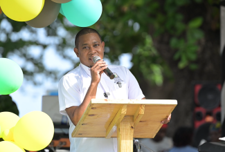 Cassava farmers in St. Thomas stand to gain from improved operational regularisation, following the announcement of land lease provisions under the newly established St. Thomas Cassava Growers Association Limited.
	Speaking during the recent St. Thomas Agricultural Show in Morant Bay, Minister of Agriculture, Fisheries and Mining, Hon. Floyd Green, indicated that the Sugar Company of Jamaica is working to regularise the farmers, adding that cassava growers will receive leases for the lands they cultivate, enabling them to expand their agricultural investments.
	Mr. Green hailed the farmers for positioning St. Thomas as a national leader in cassava production.
“In fact, last year we harvested over 120 hectares of cassava, engaging over 180 farmers; and this is despite them having a tough year with Hurricane Beryl [and] Tropical Storm Rafael. The St. Thomas cassava farmers continue to do extremely well,” the Minister said.
Mr. Green expressed particular satisfaction with the success the farmers have achieved since forming the group.
“When we first met and they raised their issues around cassava and around land, I said to them, ‘listen, the best way to deal with these issues is to form yourselves into a group’. If you look at them now, they have not only formed themselves into a group – and I hear that some of the best female farmers are a part of that group – they have also staged their very first cassava festival, and it went extremely well,” he stated.
The inaugural St. Thomas Cassava Festival was held at the Golden Grove Sports Complex on February 28.

(more)
Cassava Farmers…2
The event, which is poised to become an annual fixture, brought together stakeholders, cassava enthusiasts, and community members for a vibrant celebration of the beloved crop.
Minister Green also highlighted other ways in which St. Thomas has been leading in agriculture, noting that the parish is, “the biggest producer of East Indian and Julie mangoes and biggest supporter of the exportation of mangoes”.
St. Thomas is also leading in onion production, having yielded 3,396 tonnes last year – accounting for 60 per cent of Jamaica’s total output.
