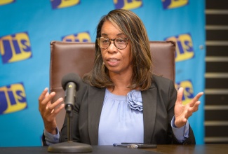 Chief Technical Director, Development Planning, Environment Policy and Management, Ministry of Economic Growth and Job Creation, Gillian Guthrie, addresses a Jamaica Information Service (JIS) ‘Think Tank’ in Kingston on Wednesday (July 23).

