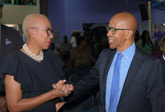 Minister of Finance and the Public Service, Hon. Fayval Williams, greets Chairman, Public Procurement Commission, Milverton Reynolds, during the agency’s fifth anniversary thanksgiving service at Celebration Church in Portmore, St. Catherine, on Sunday (July 20).

