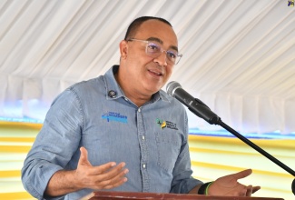 Minister of Health and Wellness, Dr. the Hon. Christopher Tufton, addresses the official reopening of the Jackson Town Health Centre in Trelawny, on Thursday (July 24).