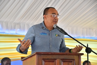 Minister of Health and Wellness, Dr. the Hon. Christopher Tufton, addresses the official reopening ceremony for the Jackson Town Health Centre in Trelawny, on Thursday (July 24).