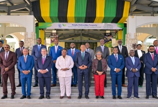 Prime Minister and Caribbean Community (CARICOM) Chair, Dr. the Most Hon. Andrew Holness (front, centre) and other regional leaders pose for the official photograph for the 49th Regular Meeting of the Conference of Heads of Government of CARICOM at the Montego Bay Convention Centre in Rose Hall, St James, on Monday (July 7). Jamaica is hosting the conference from July 6 to 8 under the theme ‘People, Partnership and Prosperity – Promoting a Secure and Sustainable Future’.

