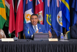 Prime Minister and Caribbean Community (CARICOM) Chairman, Dr. the Most Hon. Andrew Holness (centre), is joined by Prime Minister of St. Kitts and Nevis and incoming CARICOM Chair, Hon. Dr. Terrance Drew, and CARICOM Secretary-General, Dr. Carla Barnett, during the Closing Press Conference for the 49th Regular Meeting of the CARICOM Heads of Government at the Montego Bay Convention Centre in Rose Hall, St. James, on Tuesday (July 8).

