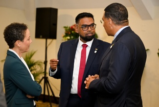 Prime Minister of Jamaica and Caribbean Community (CARICOM) Chair, Dr. the Most Hon. Andrew Holness (right), engages in discussion with President of Guyana, His Excellency Dr. Mohamed Irfaan Ali, during an External Trade Negotiation Committee Breakfast Meeting at the Jewel Grande Hotel in Montego Bay, St. James, on Monday (July 7), alongside Minister of Foreign Affairs and Foreign Trade, Senator the Hon. Kamina Johnson Smith. The event was part of the 49th Regular Meeting of the Conference of Heads of Government of CARICOM at the Montego Bay Convention Centre from July 6-8 under the theme: ‘People, Partnership and Prosperity— Promoting a Secure and Sustainable Future’.

