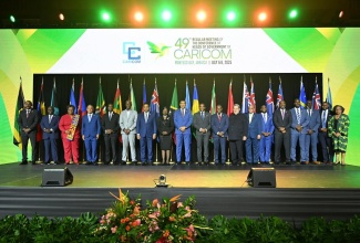 Prime Minister and CARICOM Chair, Dr. the Most Hon. Andrew Holness (ninth left), is flanked by other regional leaders during Sunday’s (July 6) opening ceremony of the 49th Regular Meeting of the Conference of Heads of Government of CARICOM, at the Montego Bay Convention Centre in St. James.


