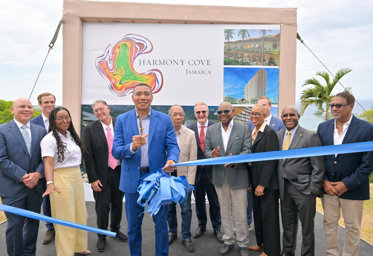 Prime Minister, Dr. the Most Hon. Andrew Holness (fifth left), cuts the ribbon for the US$1-billion Harmony Cove development project in Duncans, Trelawny on Tuesday (July 22). Among those sharing in the occasion are Chairman of Harmonisation Limited, Jeffrey Hall (left); Member of Parliament for Trelawny Northern, Tova Hamilton (third left);  Managing Partner, Nexus Luxury Collection, Christopher Anand (fourth left); Minister of National Security, Hon. Dr. Horace Chang (sixth left); Minister of Tourism, Hon. Edmund Bartlett (fourth right);  Minister of Finance and the Public Service, Hon. Fayval Williams (third right); Minister of Industry, Investment and Commerce, Hon. Aubyn Hill (second right); Opposition candidate for Trelawny Northern, Dr. Wykeham McNeill (right).

