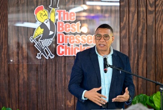 Prime Minister, Dr. the Most Hon. Andrew Holness, addresses the commissioning ceremony for a US$8 million Liquified Natural Gas (LNG) Cogeneration Plant at Best Dressed Chicken in Spring Village, St. Catherine on Tuesday (August 5).