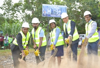 Prime Minister, Dr. the Most Hon. Andrew Holness (second right), breaks ground for the $109 million Serenity Grove Housing Development Project in Gregory Park, St. Catherine, on Tuesday (August 5). Dr. Holness is joined by (from left): Chair of the New Social Housing Programme (NSHP) Oversight Committee, Judith Robb Walters; Senior Director in the Ministry of Economic Growth and Job Creation, Richard Cargill; Permanent Secretary in the Ministry, Arlene Williams; and State Minister in the Ministry of Foreign Affairs and Foreign Trade, and Member of Parliament for the area, Alando Terrelonge.  The Project will comprise 10 units under the New Social Housing Programme (NSHP), housing approximately 38 people who lost their homes in an arson attack in 2023.