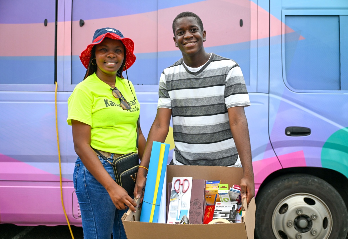 Students in Font Hill Receive School Supplies from Karing Hearts Foundation
