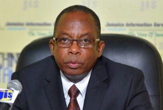 Director of Elections, Glasspole Brown.