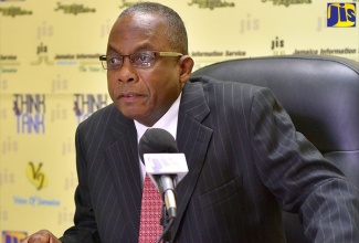 Director of Elections, Glasspole Brown.