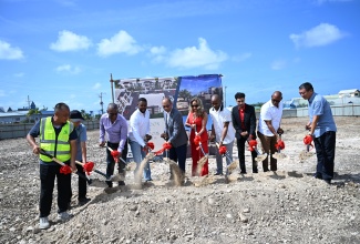 Minister of National Security and Member of Parliament for St. James North Western, Hon. Dr. Horace Chang (fifth left), and Mayor of Montego Bay, Councillor Richard Vernon (fourth left), participate in the symbolic breaking of ground for the 1092 Palms Apartment Complex in Ironshore, Montego Bay, on Friday (August 15). Joining them (from left) are Project Manager, Henan Fifth Construction Group, Changfong Fu; Deputy Managing Director of Henan Fifth Cnstruction Group, Yumzing Zhang; Councillor for Montego Bay North Eastern, Senator Charles Sinclair; Director of Heritage Captial Shares International, Shelly-Ann Grant; Chief Executive Officer at LS Holdings Construction, Sean Lawrence; Director of LS Holdings Construction, Stephen Grant; Project Developer with LS Holdings Construction, Vincent Hutchins, and Lead Contractor at Henan Fifth Construction, Qishan Liu.