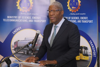 Managing Director of the Jamaica Urban Transit Company (JUTC), Owen Ellington, addresses a recent press conference held at the Petroleum Corporation of Jamaica (PCJ) Auditorium in New Kingston.

