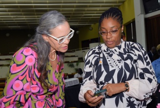 Chair of the Child Protection and Family Services Agency (CPFSA) Advisory Board, Dr. Diana Thorburn (left), converses with educator and Chief Executive Officer of Value in the Voice, Ornecia Blackstock, during the CPFSA’s 2025 PEP Awards Ceremony at the Jamaica Conference Centre in Kingston on Thursday (August 21). Mrs. Blackstock was the keynote speaker.

