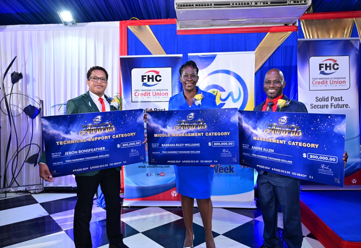 Civil Servants of the Year for 2024/25 (from left) Psychiatric Nursing Aide, Ministry of Health and Wellness (Kingston and St. Andrew Health Department), Jeron Bonsfeather (Technical Support Category); Field Supervisor, Statistical Institute of Jamaica (STATIN), Barbara Riley Williams (Mid-Managerial Category), and former Computer Services Manager, Jamaica Information Service (JIS), André Allen (Managerial Category), display cheques for their cash prizes awarded during the presentation ceremony at the Terra Nova All-Suite Hotel in St. Andrew.