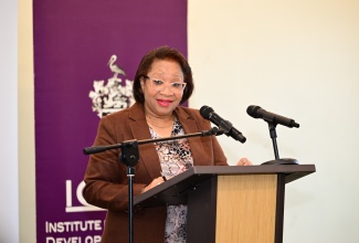 Permanent Secretary in the Ministry of Justice, Grace-Ann Stewart McFarlane, delivers remarks during the launch of an islandwide social justice and gender training workshop series for members of the justice sector at the Courtyard by Marriott Hotel in Kingston on Wednesday (August 20).

