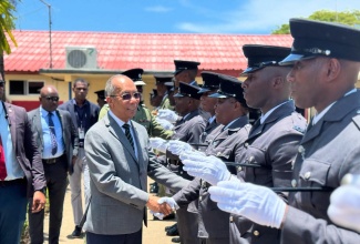 Deputy Prime Minister and Minister of National Security, Hon. Dr. Horace Chang, greets graduates of the Department of Correctional Services’ 86th Intake during the Passing Out Parade held on August 15 at the Carl Rattray Staff College in Runaway Bay, St. Ann.

