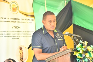 Minister of Agriculture, Fisheries and Mining, Hon. Floyd Green, addresses the reopening of the St. Elizabeth Municipal Corporation's animal pound in Myersville in the parish on Friday ( Aug.15). 