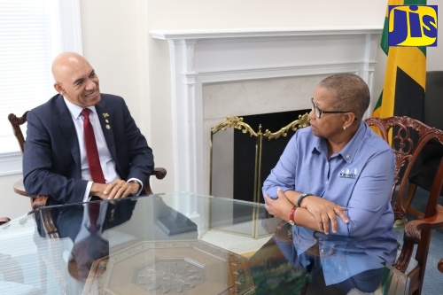 Jamaica’s Ambassador to the United States, His Excellency Major General (Ret’d) Antony Anderson, speaks with Jamaica's newly elected Kiwanis International President and member of the Kiwanis Club of Hopewell, Hanover, Hope Markes, who recently stopped at the Embassy in Washington DC, during a break in her travel on official Kiwanis duties. Ms. Markes has made history as the first woman of colour and Caribbean national to be President-elect of Kiwanis International. She will assume official duties on October 1, 2026.  