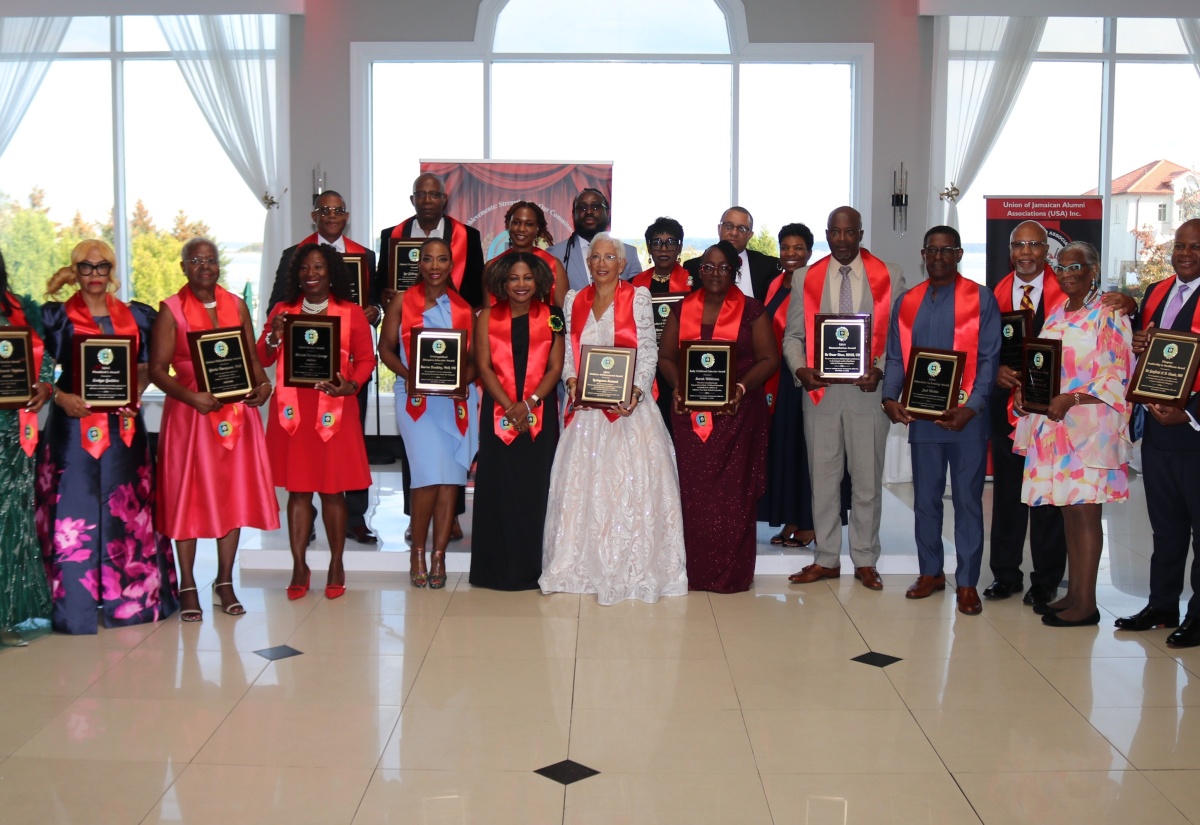 Minister of Education, Skills, Youth and Information, Dr. the Hon. Dana Morris Dixon (centre), is surrounded by Union of Jamaica Alumni Association awardees at the organisations 35th anniversary luncheon and awards gala held on September 14, at the Greentree Country Club New Rochelle, New York.

