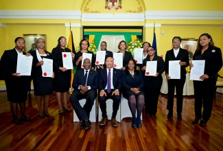 Governor-General, His Excellency the Most Hon. Sir Patrick Allen (centre, seated); Chief Justice, Hon. Bryan Sykes (left, seated and President of the Court of Appeal, Hon. Mrs. Justice Marva McDonald-Bishop (right, seated), share a photo opportunity with 10 members of the judiciary who were sworn in during a ceremony at King’s House on Monday (September 1).