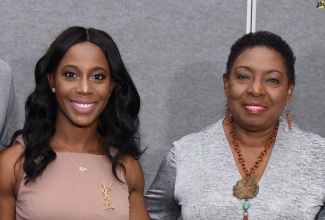 Minister of Culture, Gender, Entertainment and Sport, Hon. Olivia Grange (right), with Jamaican sprint legend, Hon. Shelly-Ann Fraser-Pryce.

