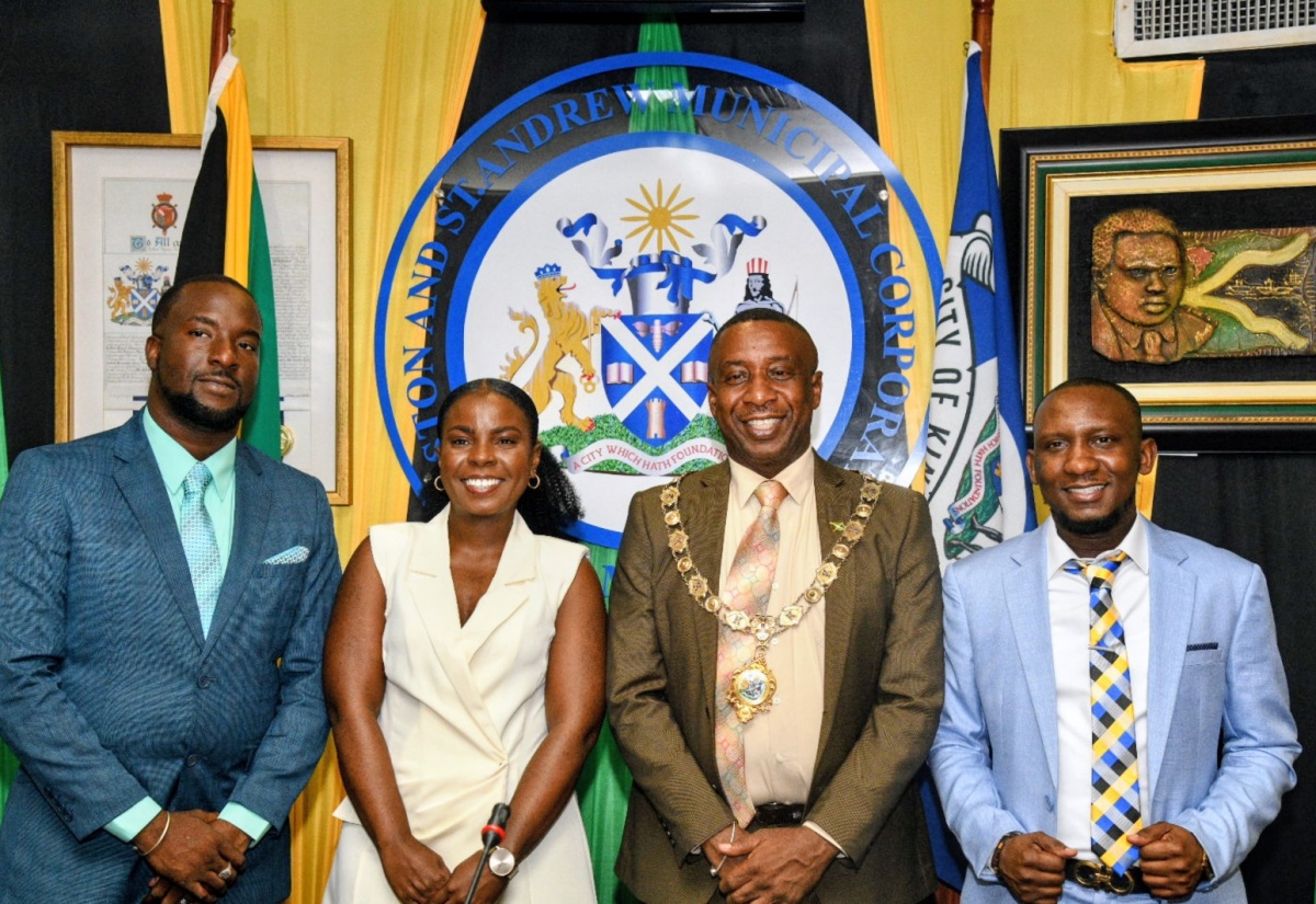 Mayor of Kingston, Councillor Andrew Swaby (second right), shares a moment with the three newly elected Councillors (from left) Dellon Gayle for the Denham Town Division; Phylicia Henry Golding for the Chancery Hall Division; and Kelvin Hall for the Olympic Gardens Division. They were sworn in during a special sitting of the Kingston and St. Andrew Municipal Corporation (KSAMC) at the Corporation