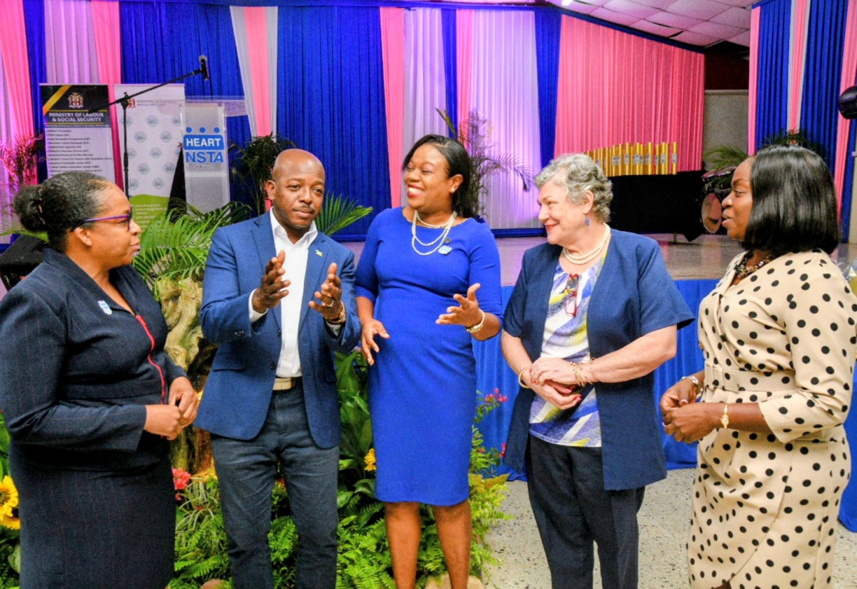 Minister of Labour and Social Security, Hon. Pearnel Charles Jr., engages in discussion with (from left) Managing Director, National Training and Programmes Division, HEART NSTA/Trust, Dr. Cheryl McLaughlin; Regional Director for HEART’s Region One, Dr. Sasha Shim-Hue; Executive Director, Mona Ageing and Wellness Centre, Professor the Most Hon. Denise Eldemire-Shearer; and Executive Director, National Council for Senior Citizens (NCSC), Cassandra Morrison. The occasion was the NCSC–HEART/NSTA Trust Digital Literacy Programme graduation ceremony at the Stony Hill HEART Academy in St. Andrew on Friday (September 26). The event formed part of the activities commemorating Senior Citizens Month 2025, being observed throughout September under the national theme: ‘Respect, Protect, Empower, Connect’.