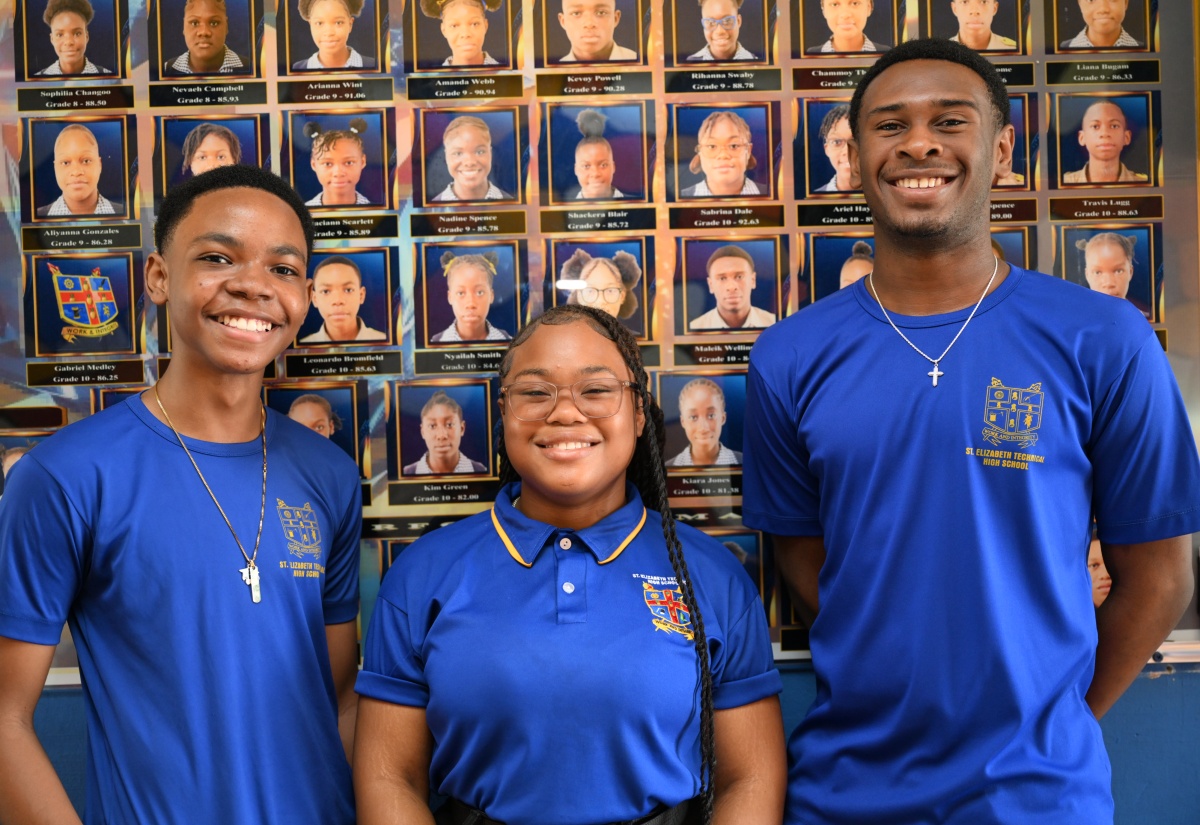 Seventeen-year-old student of St. Elizabeth Technical High School (STETHS), Sabrina Dale (centre), is joined by her fellow top achievers in the Caribbean Secondary Education Certificate (CSEC) examinations, Leonardo Bromfield  (left), and Maleik Wellington.
