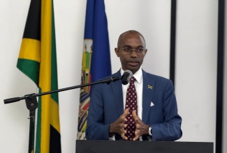 Permanent Secretary in the Office of the Prime Minister (OPM), Ambassador Dr. Rocky Meade, delivers the keynote address during the opening ceremony for the Jamaica Cyber Youth Empowerment Academy at the S Hotel in New Kingston, on Monday (September 29).

