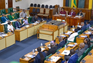 Speaker of the House of Representatives, the Most Hon. Juliet Holness (left); Chief Hansard Reporter, Carl Bryan (centre), and Clerk to the Houses of Parliament, Colleen Lowe (right), lead the Opening Ceremony for the Orientation of Members of Parliament (MPs) at Gordon House, on Tuesday (September 30).