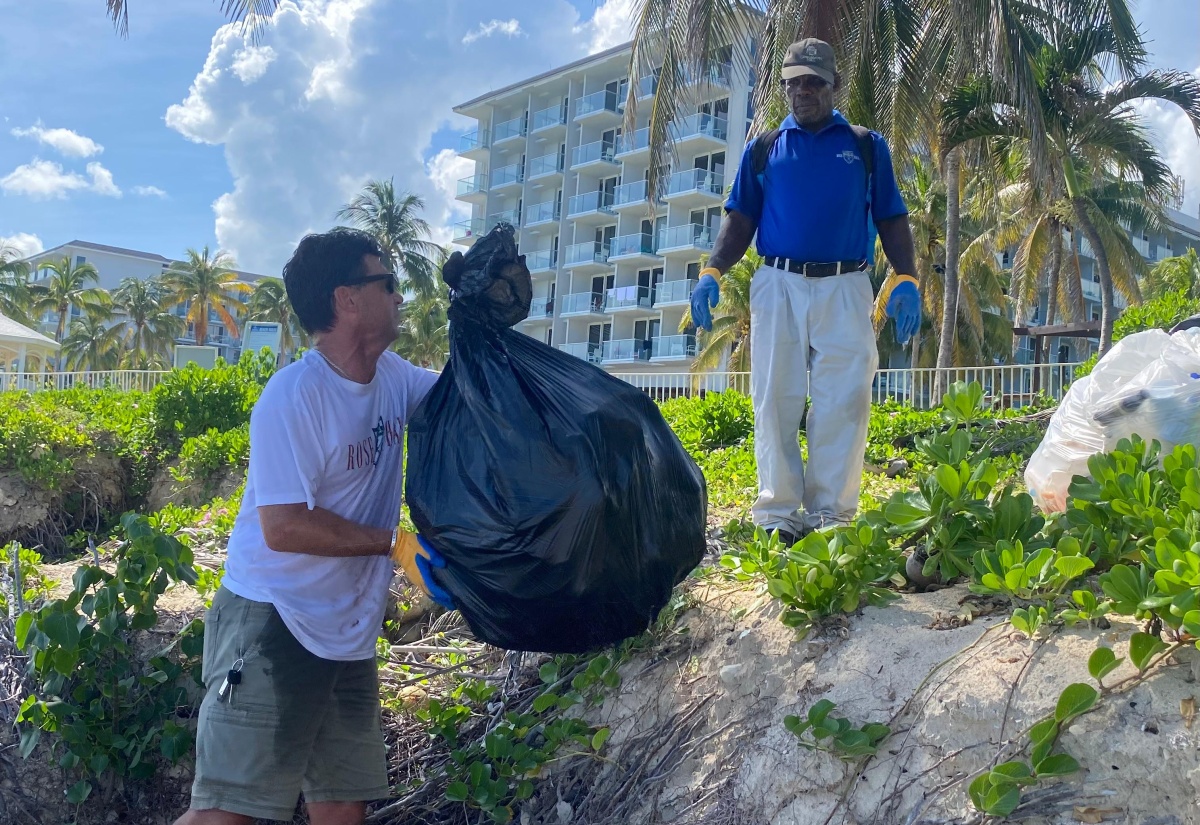 Persons Take Part in International Coastal Cleanup Day