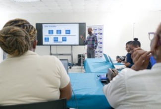 Head of Practice at UK-based data privacy firm Securys Limited, Andre Palmer, speaks at a data privacy and protection workshop for micro, small and medium-sized enterprise (MSME) operators, hosted recently by the Jamaica Business Development Corporation (JBDC) at its Incubator & Resource Centre on Marcus Garvey Drive in Kingston.

