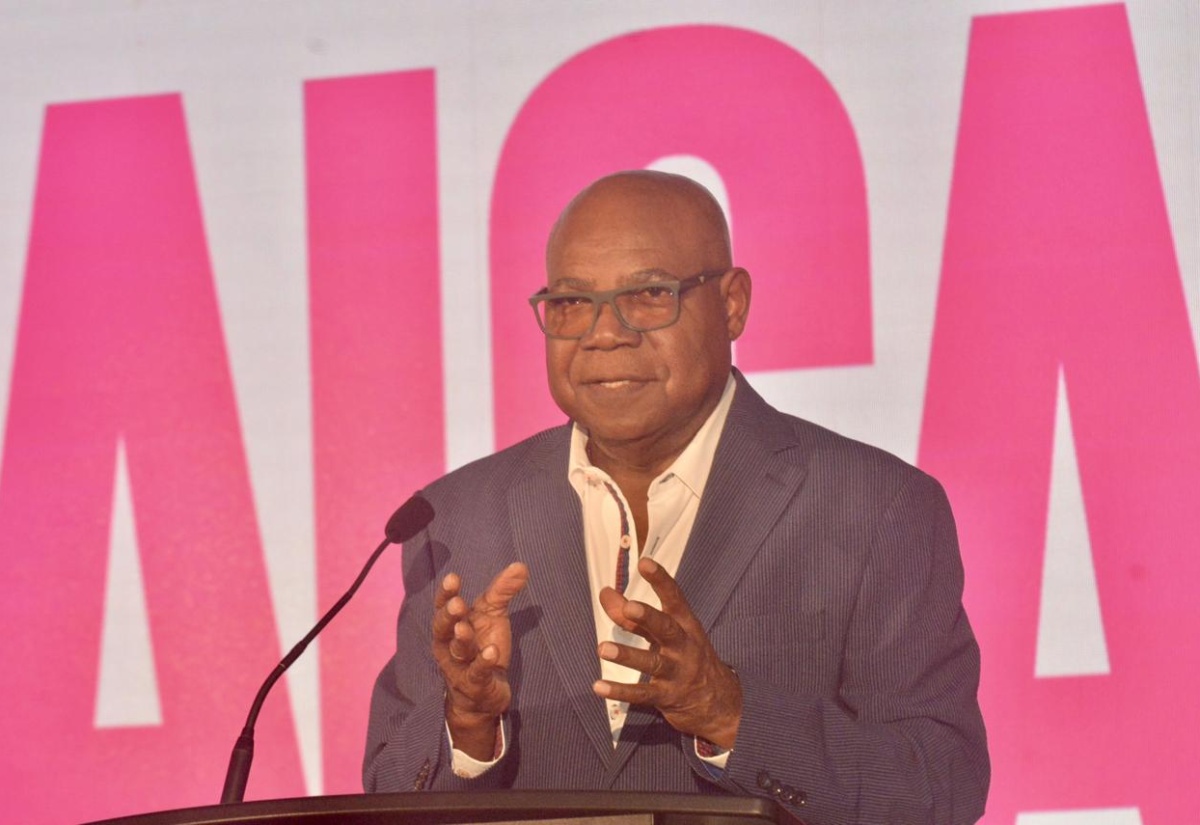 Minister of Tourism, Hon. Edmund Bartlett, addresses tourism stakeholders and business interests at the Jamaica Product Exchange tradeshow, at the Jewel Grande in Montego Bay, St. James, on September 23.