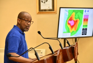 Principal Director of the Meteorological Service of Jamaica (Met Service), Evan Thompson, provides an update on Hurricane Melissa during a special press briefing at Jamaica House on Saturday (October 25).