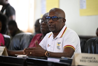 Parish Manager for the Portland office of the Ministry of Labour and Social Security, Maxwell Hamilton, speaking during a meeting of the Parish Disaster Committee in Port Antonio on October 23. 

