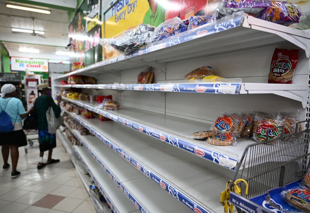St. Thomas Shoppers Empty Supermarket Shelves as Melissa Looms