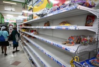 Empty shelves were seen at Joong's Supermarket in Morant Bay, St. Thomas, on October 24 as residents prepared for the effects of hurricane Melissa.