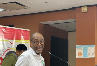 Principal Director, Meteorological Services Branch in the Ministry of Water, Environment and Climate Change, Evan Thompson, speaks at a press briefing at the National Emergency Operation Centre (NEOC), located at the Office of Disaster Preparedness and Emergency Management (ODPEM) Headquarters on Haining Road in Kingston, today (October 27).