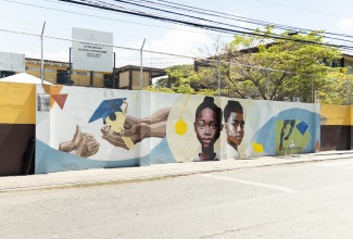 The newly unveiled mural at Charlie Smith High School in Kingston, which was created under the European Union-funded BRIDGE Project.

