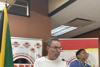Energy, Telecommunications and Transport Minister, Hon. Daryl Vaz,  Hon. Daryl Vaz, addresses Tuesday’s (October  28) special press conference on Hurricane Melissa at the National Emergency Operations Centre (NEOC) at the Office of Disaster Preparedness and Emergency Management (ODPEM) in Kingston.